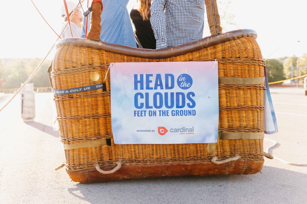 Cardinal Digital Marketing's hot air balloon reads "head in the clouds, feet on the ground"